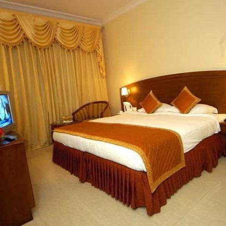 Aj International Bangalore Quarto foto